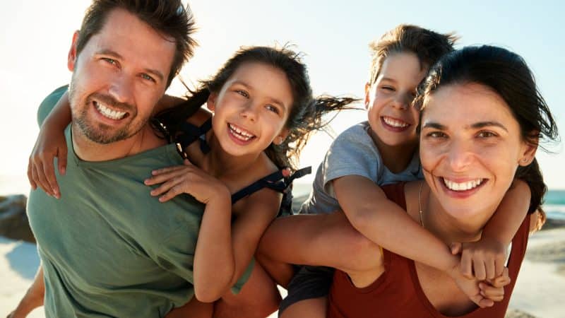 Counting blessings a happy family at the beach
