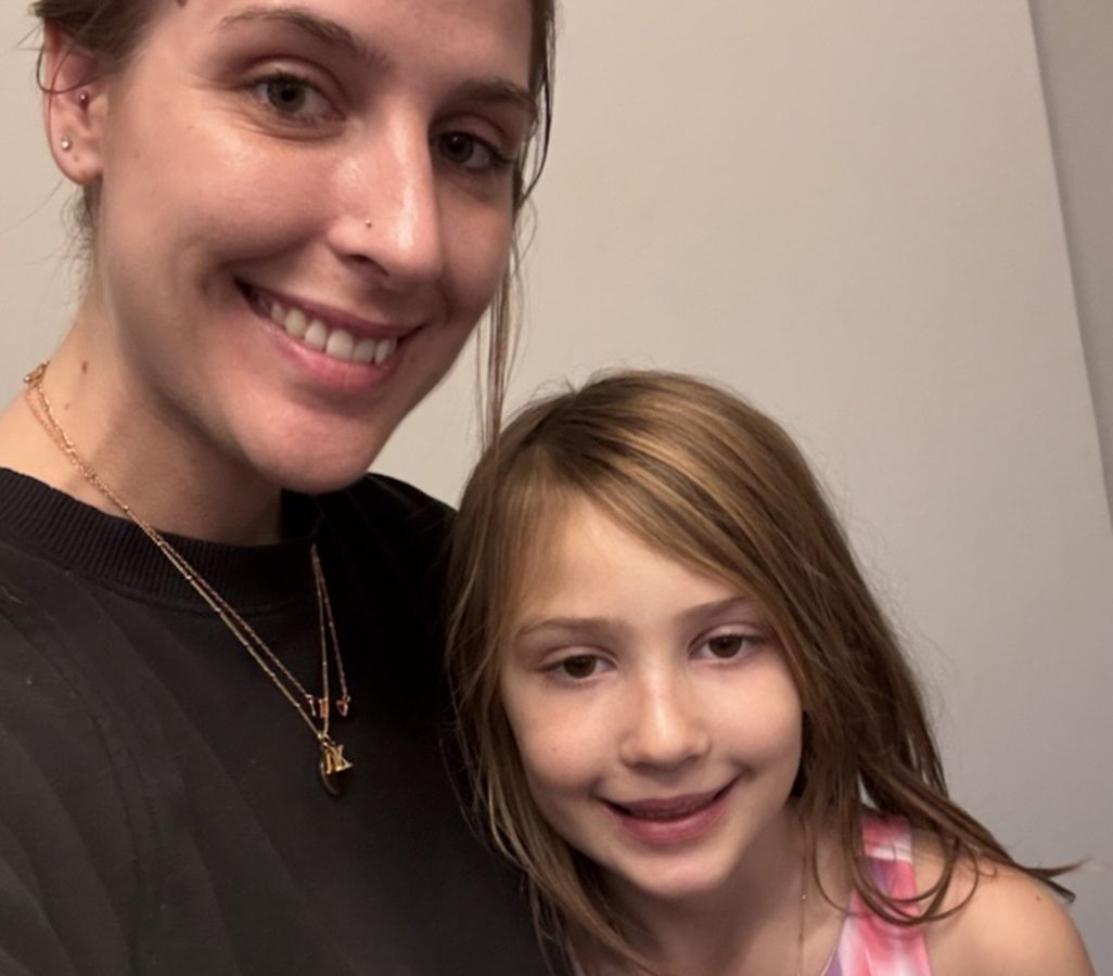 Robyn and Olivia wearing their Starfish Project necklaces.